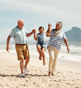 Family enjoying a summer day together on the beach.