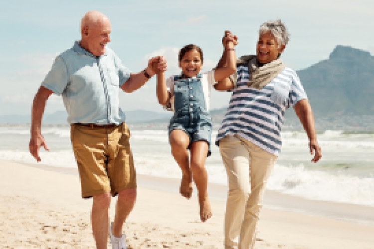 Family enjoying a summer day together on the beach.